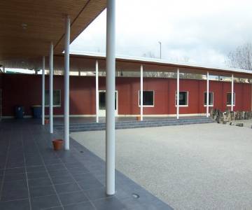 Restauration et extension avec ossature métallique du centre touristique Saint Jean le Centenier