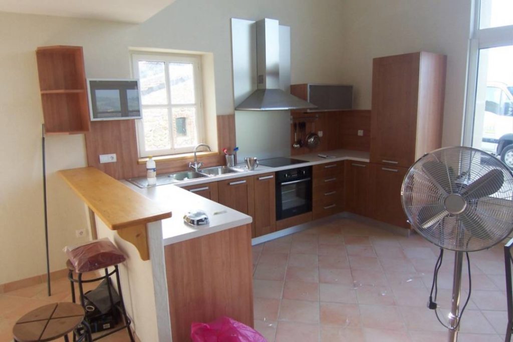 Réhabilitation d'une maison en galets - AFD Architecte