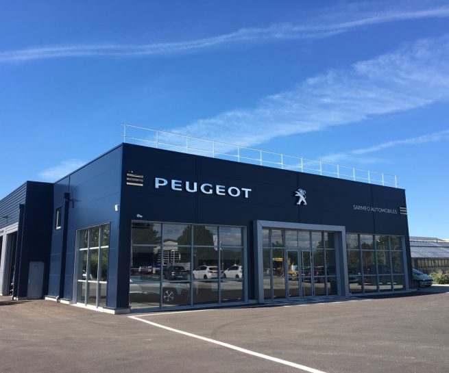 Construction d’un garage automobile selon les normes Peugeot